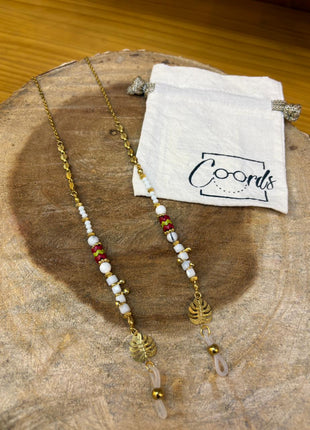 Cuelga Gafas Hoja Dorada